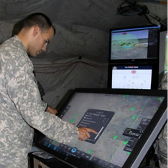 US Army soldier at interactive touch-wall