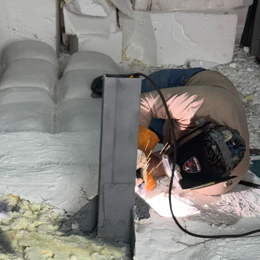 Welding the steel post inside the foam